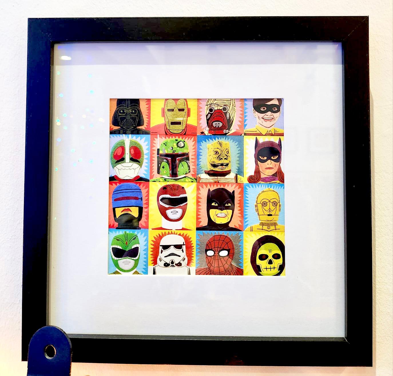 Heroes and Villains card framed